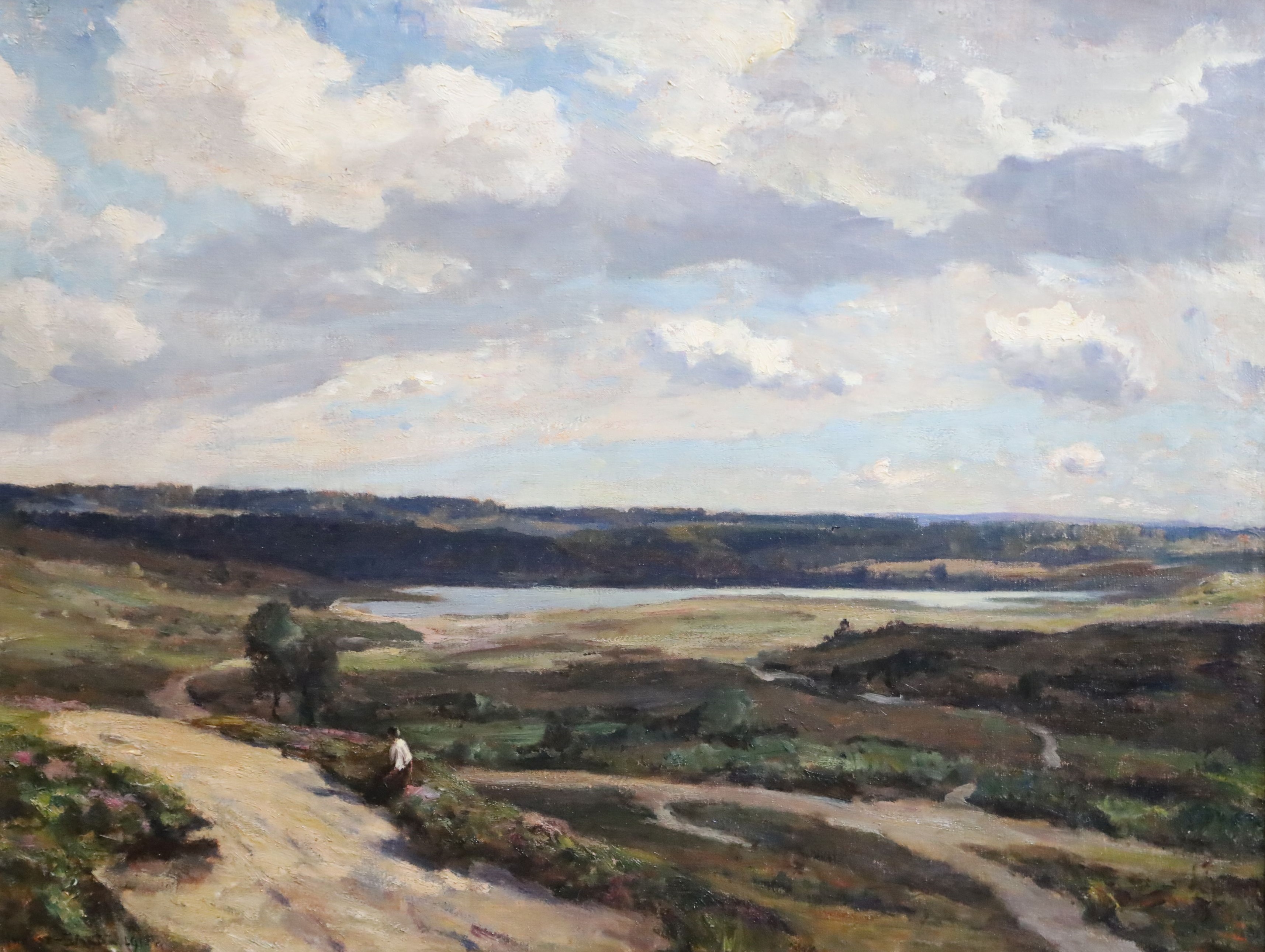 Sir Herbert Edwin Pelham Hughes Stanton RA PRWS (1870-1937) Figure in an open landscape 21 x 27.5in.